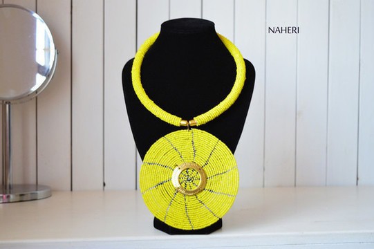 African yellow beaded necklace disc pendant with brass