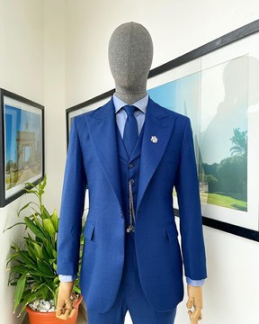 A glen plaid check, lapis blue - nobility - “Board Room” peak lapel suit