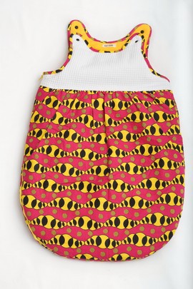 Gigoteuse Wax Fuchsia jaune noire Fait main. 0 à 12 mois