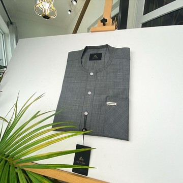 An Irish Grey Tailored Kaftan with ABV diamond shape Australian Swarovski button.