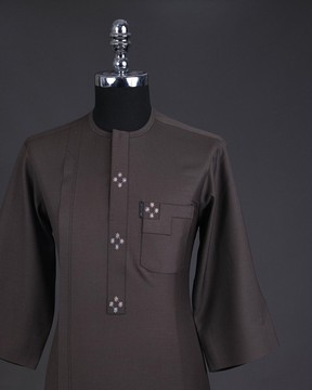 An Uber brown, front flap with connected stars, 3/4 sleeve African senator kaftan native.