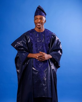 A Navy blue, arewa embroidery, front cut towards back, traditional Agbada