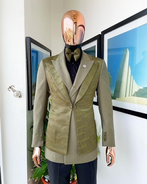 A “scritto” (inscribe your name) dark olive green tuxedo