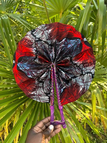Wax and leather fan in its pouch