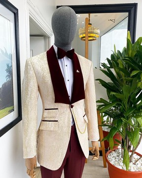 A “Mandarin” dispersed gold ruffle pattern burgundy shawl lapel jacquard suit