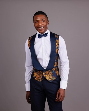 A U shaped shawl lapel floral jacquard tuxedo waistcoat.