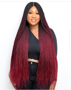 Center part tiny twist braided wig