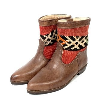 High-end handmade genuine leather and kilim boot.