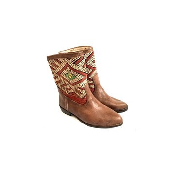 High-end handmade genuine leather and kilim boot.