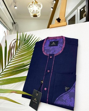 A navy blue kaftan.