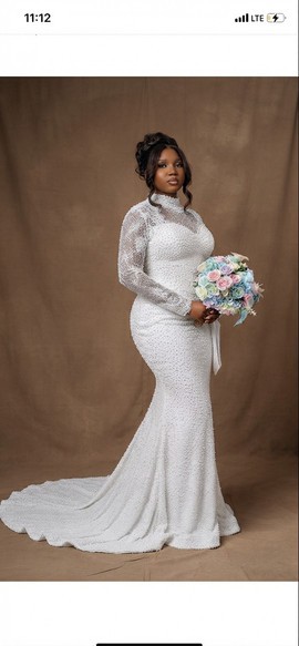Robe de mariée sirène blanche perlée