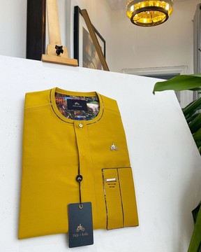 A honey yellow, clear view glass Swarovski buttons detailing kaftan native.