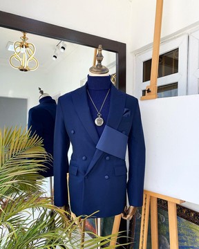 A tailored Navy Blue Extra-fine jorgecarli Merino Sheep wool “Oranmiyan” double breasted suit.