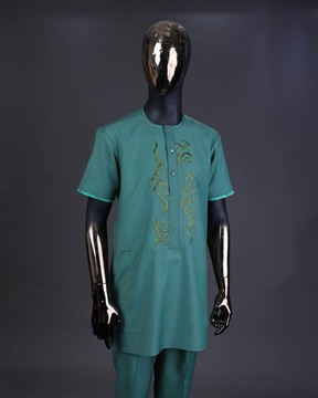 A sea green, floral embroidery with matching Swarovski button detailing kaftan &amp; sokoto