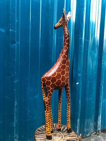 Wooden giraffe home decor curving