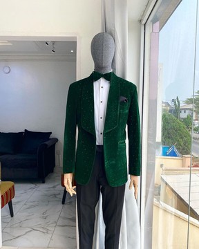 An emerald green velvet dinner shawl lapel tuxedo suit