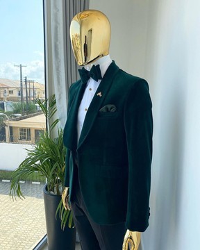 An Emerald green shawl lapel velvet tuxedo suit, bow tie, pant trousers