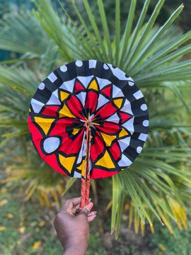 Wax &amp; leather fan in its pouch