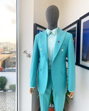 A monochrome Peak lapel turquoise blue suit