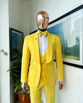 A middle yellow linen shawl lapel jacket