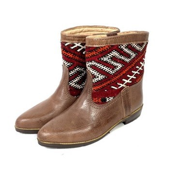 High-end handmade genuine leather and kilim boot.
