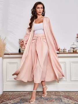 coat with trumpet sleeve &amp; draped front skirt