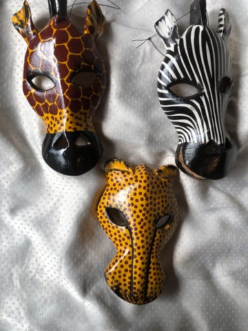 A set of 3 wall hanging face masks decor