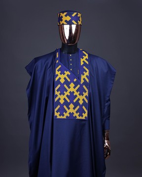 A navy blue, layered tettri pattern embroidery detailing agbada
