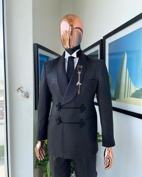 A “sajora” black inverted square patterned metallic jacquard tuxedo suit