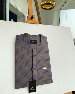 A Windowpane tortilla brown with orange &amp; navy blue stripe, front flap detailing kaftan native.
