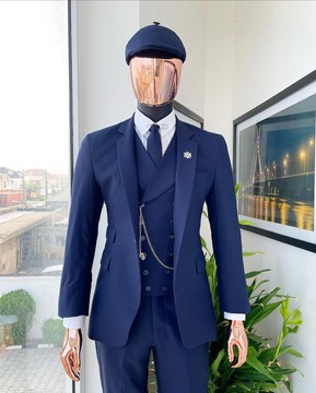 A “peaky blinders” navy blue, tiny square patterned - Jorgecarli super 140’s- “Board Room” suit