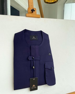 An egg plant purple, combat front flap &amp; pocket with black Swarovski button detailing kaftan native.