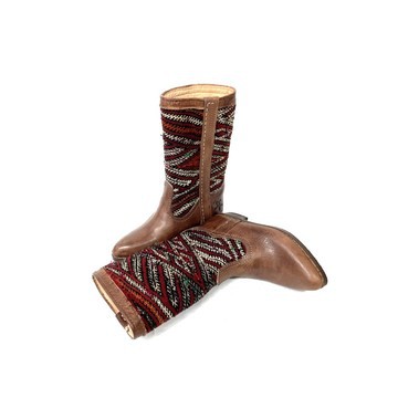 High-end handmade genuine leather and kilim boot.