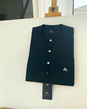 A Charcoal Black senator Kaftan with silver Swarovski buttons details.