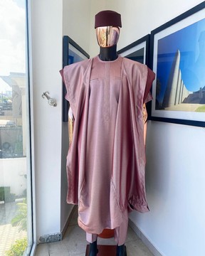 A classic light burgundy “kagbada”, Senator kaftan, burgundy round hat &amp; sokoto