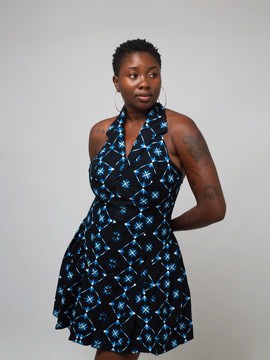 Women's short dress with blue geometric pattern and open back