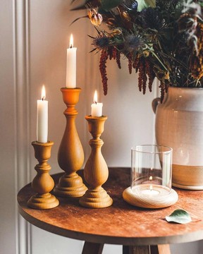 A set of 3 Wooden candlestick holders