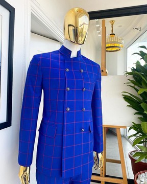 An ultramarine blue &amp; candy red  double breasted safari suit