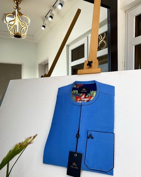 A Skye blue Men’s tailored kaftan.