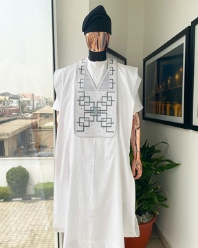 A white precision dropping connected square embroidery agbada