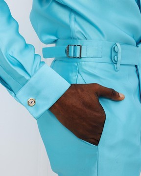 A Mikado Silk, turquoise blue, Gurkha pant with covered belt jab.
