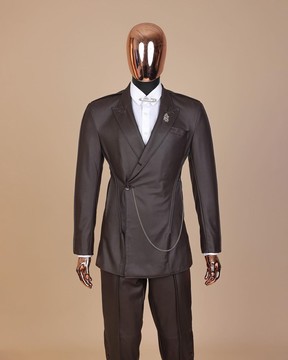 A #Herd” brown leather, knitted &amp; outer layered peak lapel wrap suit