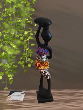 EBONY WOOD AND PEARL SCULPTURE STATUETTE