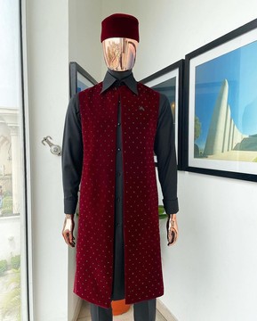 An “Eyes Wide Shut” mahogany red soaked Italian velvet Ceremonial suktan with black Swarovski