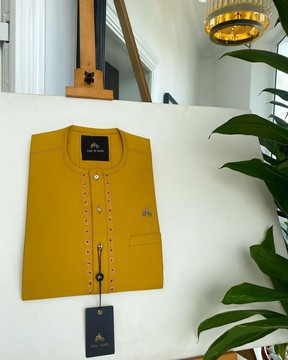 An Ash grey,  traditional senator kaftan native.