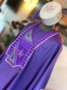 A purple embroidered Agbada