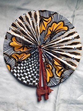 Fan with leather and siamourail wax