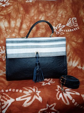 Leather Bag and Serer Loincloth