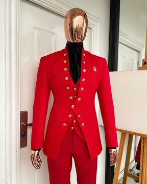 An “empire” candy red, floral patterned metallic jacquard Suit
