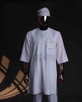 A white, curved &amp; square shaped pocket with floral embrodery details kaftan